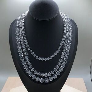 Express glass bead triple strand dressy statement style necklace.